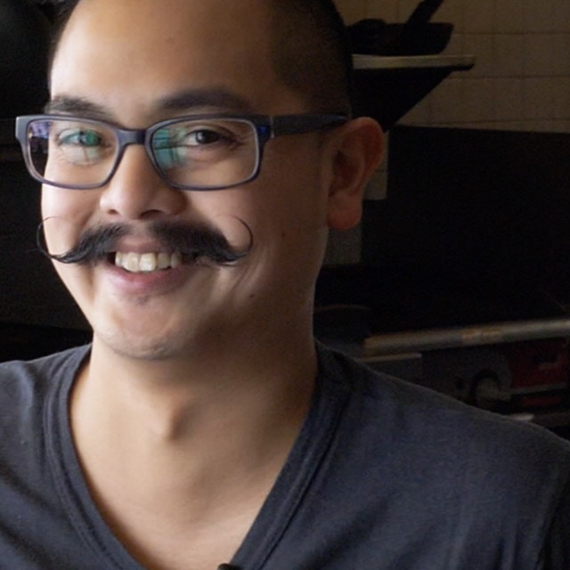 A man smiling.